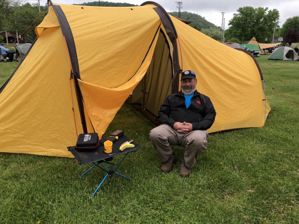 Jim K. at the GR3 with one of those tents where the cycle sleeps too!